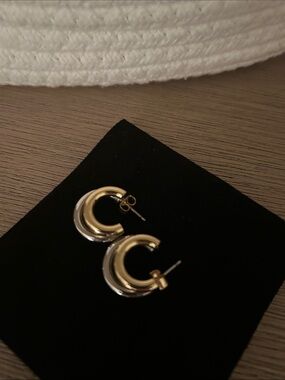 SHASHI Two-Tone Gold and Silver Curved Hoop Earrings